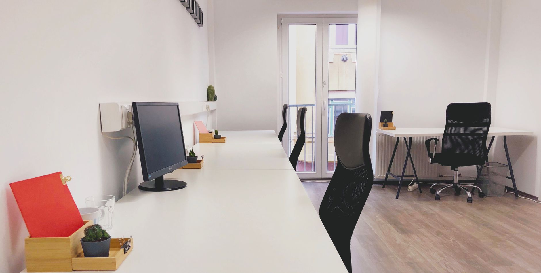 Desks in a bright coworking space